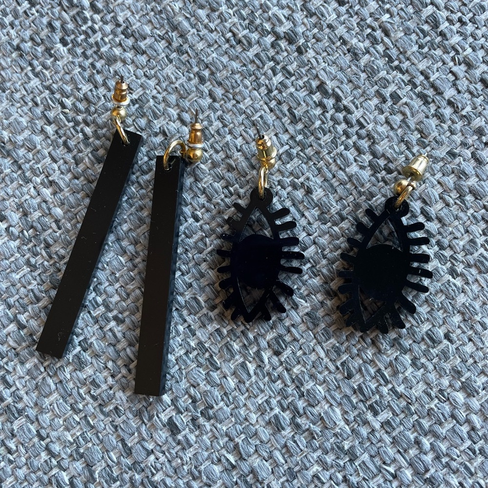 Pair of ISLY NYC icon earrings